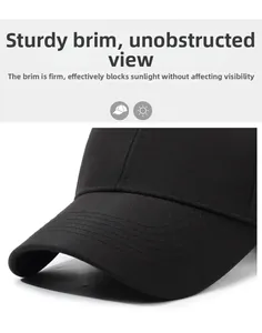 Close-up of durable black baseball cap brim with precise stitching and stiff sun visor