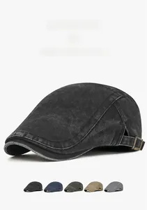Detail view of washed denim flat caps in five colors with adjustable metal buckles