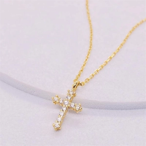 Elegant S925 sterling silver cross necklace with sparkling crystals on gold chain