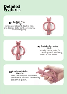 Pink rabbit silicone teether with dual easy-grip handles and soft textured back brush