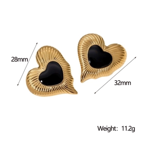 Detail showing dimensions of gold heart earrings with black texture and 28mm size