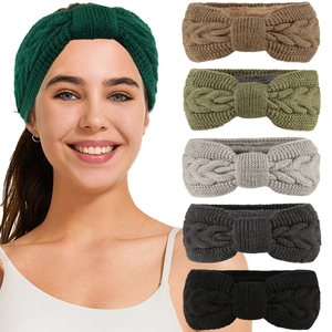 Detailed knitting texture of various thermal winter headbands with bowknot designs