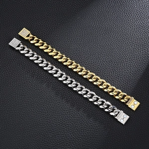 Detail of hip hop Cuban link bracelets in gold and silver with square magnetic clasps