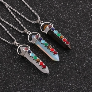 Three chakra hexagonal pillar necklaces with white crystal, opal, and tiger eye pendants