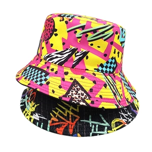 Modern graffiti bucket hats featuring colorful geometric patterns and street style print