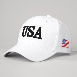 White baseball cap with bold USA embroidery and American flag patch on side