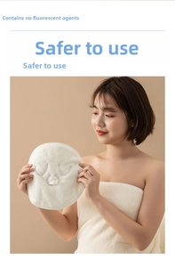 Close-up of soft thick white cotton face towel mask with precise eye and nose cutouts