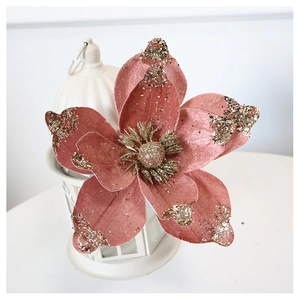 Close-up of champagne velvet flower with golden glitter edges for Christmas decor