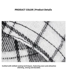 Dettaglio del tessuto a quadri bianco e nero con cuciture resistenti e trama a maglia