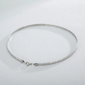 Minimalist silver stainless steel heart necklace with a sleek flat snake chain design