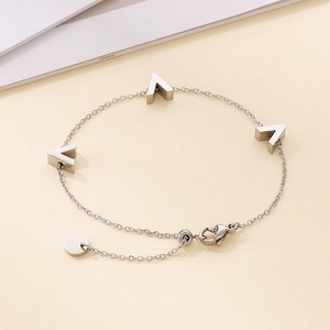 Minimalist silver chain bracelet featuring three stereoscopic V-shaped pendants with lobster clasp