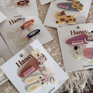 Set of 2 cute acrylic animal hair clips featuring cartoon rabbit dog and cat designs