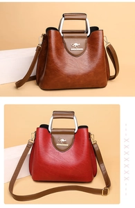 Detail view of the soft PU leather tote bag with metallic handles and a detachable strap