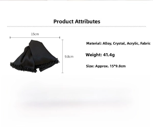 Detail of black fabric bow hair claw with crystals, measuring 15cm x 9.8cm and weighing 41.4g