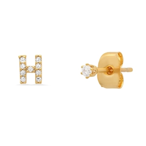 Detailed macro of gold S925 silver initial H stud earring with sparkling crystals
