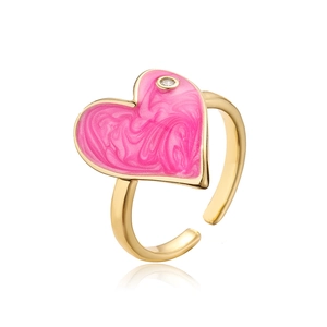 Detail of pink marble enamel heart ring with gold plating and zircon accent