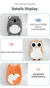 Detail of soft microfiber hand towels featuring cute koala, owl, and fox animal embroidery