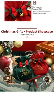 Detail of velvet Christmas drawstring gift bags with gold bells and bow decoration