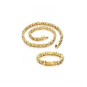 Detailed view of 8mm gold Byzantine stainless steel necklace and bracelet set