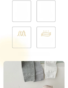 Detail of breathable hollow-out cotton socks in soft grey and beige neutral tones