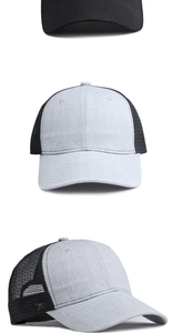 Detail view of denim and mesh trucker hat showing top, front and side panels