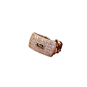Rose gold chain ring featuring a rectangular zircon pavé face with an S-shaped center logo