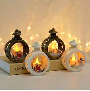 Close-up of LED Christmas lanterns with Santa and Snowman figures on a warm background