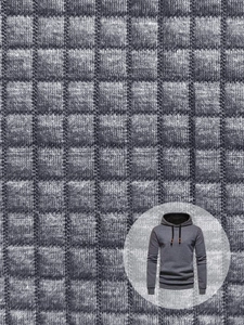 Close-up of textured waffle pattern fabric on a men's dark grey hooded sweatshirt
