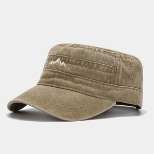 Detail of mountain embroidery on khaki washed cotton cadet cap with breathable eyelets