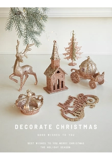 Detailed view of champagne gold glitter Christmas ornaments featuring elk and church shapes