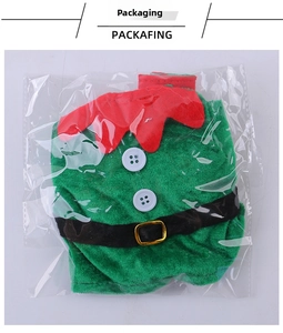 Detailed view of elf-style Christmas wine bottle cover in transparent packaging