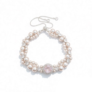 Elegant pearl bracelet with pink zircon crystal and adjustable silver chain link
