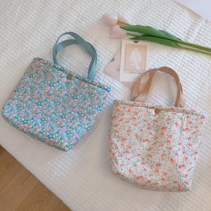 French floral cotton lunch bag with insulated lining and metal snap closure
