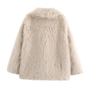 Close-up of the plush texture and fluffy faux fur fabric of the apricot beige coat