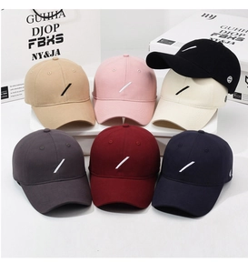 Multiple colors of cotton baseball caps with side badge and slash embroidery details