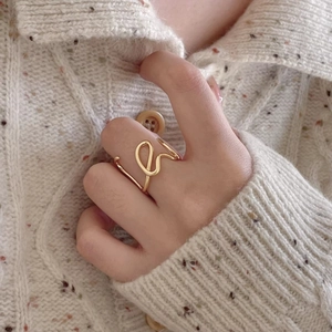 Minimalist 925 sterling silver gold-plated LOVE ring with abstract wrap-around line design