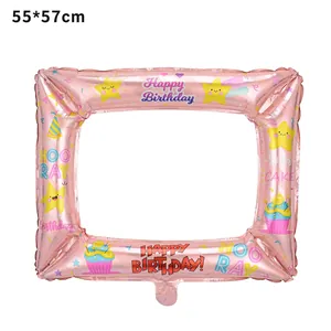 Detailed view of pink foil photo frame balloon with stars and cupcakes for birthday parties