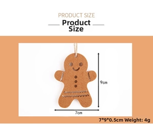 Detailed view of gingerbread man felt ornament with 7x9cm dimensions and size specs