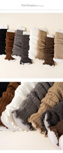 Detail of ribbed knit leg warmers in various earth tones with elegant ruffled edges