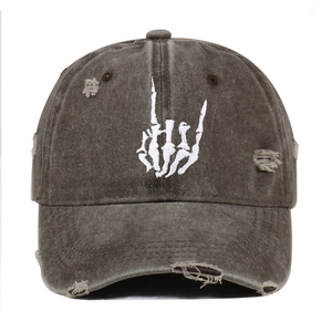 Vintage washed baseball cap with embroidered skeleton rock hand gesture and distressed details