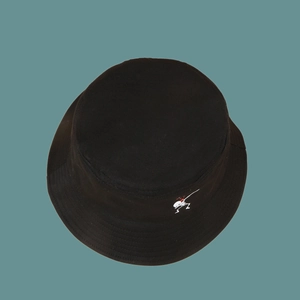 Close-up of black cotton bucket hat featuring white dabbing skeleton embroidery detail