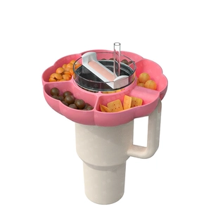 Pink silicone snack platter for 40oz tumbler with flower compartments and dust lid