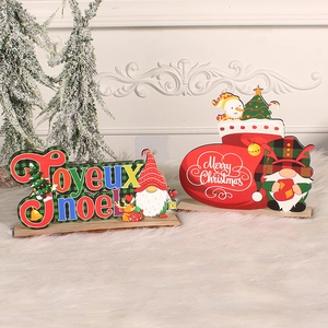 DIY wooden Christmas table signs with festive gnomes, reindeer and snowflake patterns