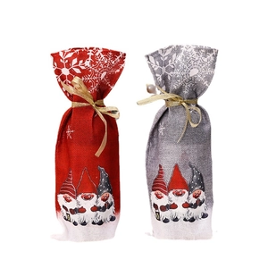 Christmas wine bottle covers with gnome prints and snowflakes in red and grey colors