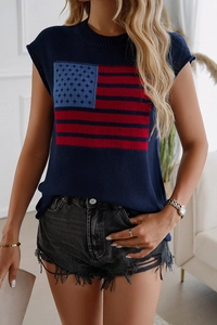Detail of navy knit sweater vest featuring US flag pattern and ribbed round neck