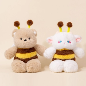 Cute plush bear and sheep toys dressed in bee costumes with yellow antennae and soft fur