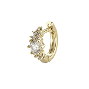 Coffee gold geometric earring with sparkling central clear diamond in professional close-up