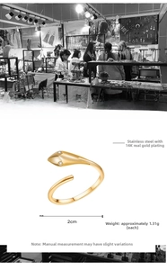 Macro shot of gold-plated snake ring showing 2cm diameter and 1.31g weight detail