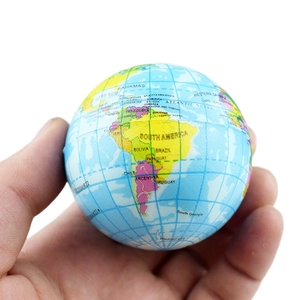 Handheld view of a mini Earth globe foam squeeze ball for stress relief and education