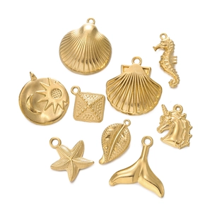 Detailed assortment of gold plated stainless steel sea themed charms for DIY jewelry making